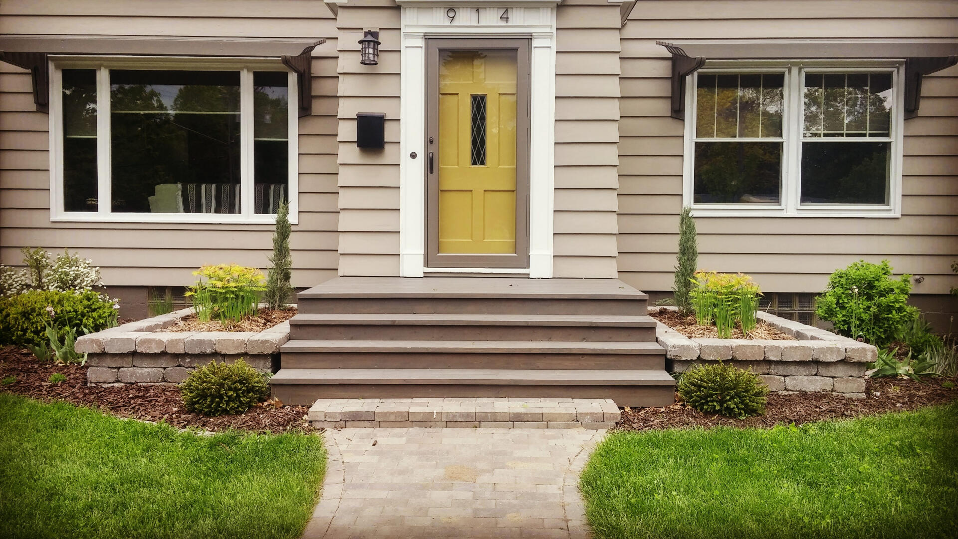 Rectangle planters help balance the front door